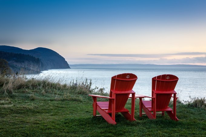 Canada's tweet photo. Have you seen these #redchairs in Canada’s National Parks? They offer visitors a chance to take a break and connect with @ParksCanada’s beautiful surroundings. Share your own pics from the chair with the hashtag #sharethechair! https://t.co/4exjgAqO4A
