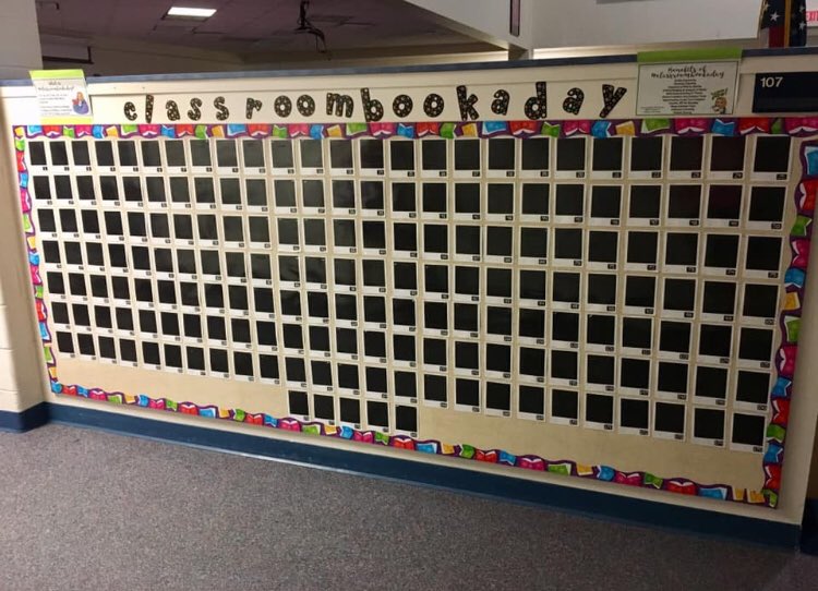 KReilley5's tweet photo. Moved classrooms from upstairs to downstairs, and now I’m on the outside wall of our school library! Hoping have the #classroombookaday board in this space will cause other classroom students to peruse the picture books we’ve read and ask for them when they visit the library. https://t.co/okHnuzoEki