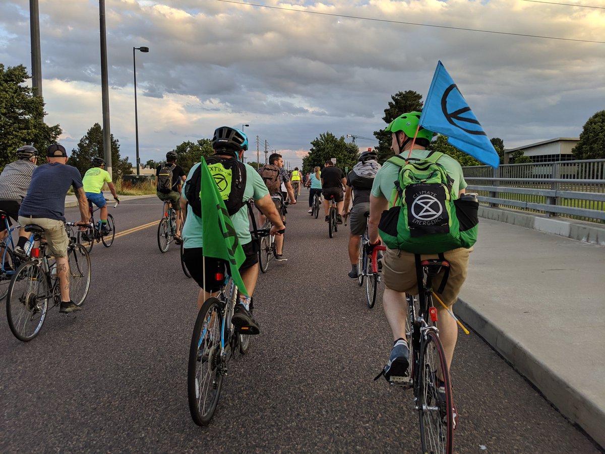 MassDenver's tweet photo. Loved seeing a contingent from @ExtinctionR at last night's Denver Critical Mass. ✊ https://t.co/udPCksaY7r