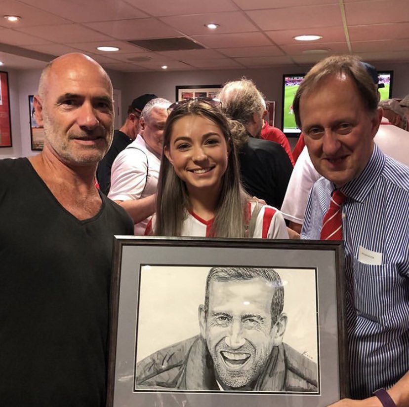 IzzyCSCx's tweet image. Thank you for all the kind words about the drawing! So proud to have it in the supporters bar! Thank you so much @PaulClayden6 for the frame, and @1887RedArmy for making our club so proud. Also thank you @davepperlmutter for the photo! #ctfc #lofc