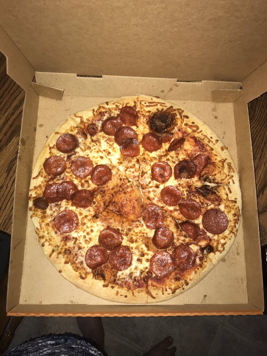 Brook3Vasquez's tweet photo. @littlecaesars ...what is this? Parts are missing cheese and parts are so burnt they’re black! https://t.co/7DmmUCvTcg