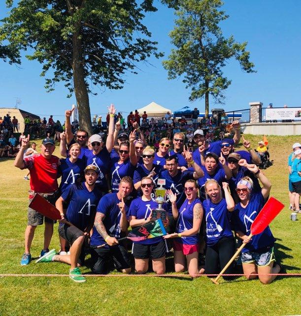Gbriggz's tweet photo. @Affinity_Plus Purple Paddlers won the Banker's Cup at the @BJIDragonBoat races today! 
@Coach_Fleck we rowed that dang boat! https://t.co/dGbdUb2w1y