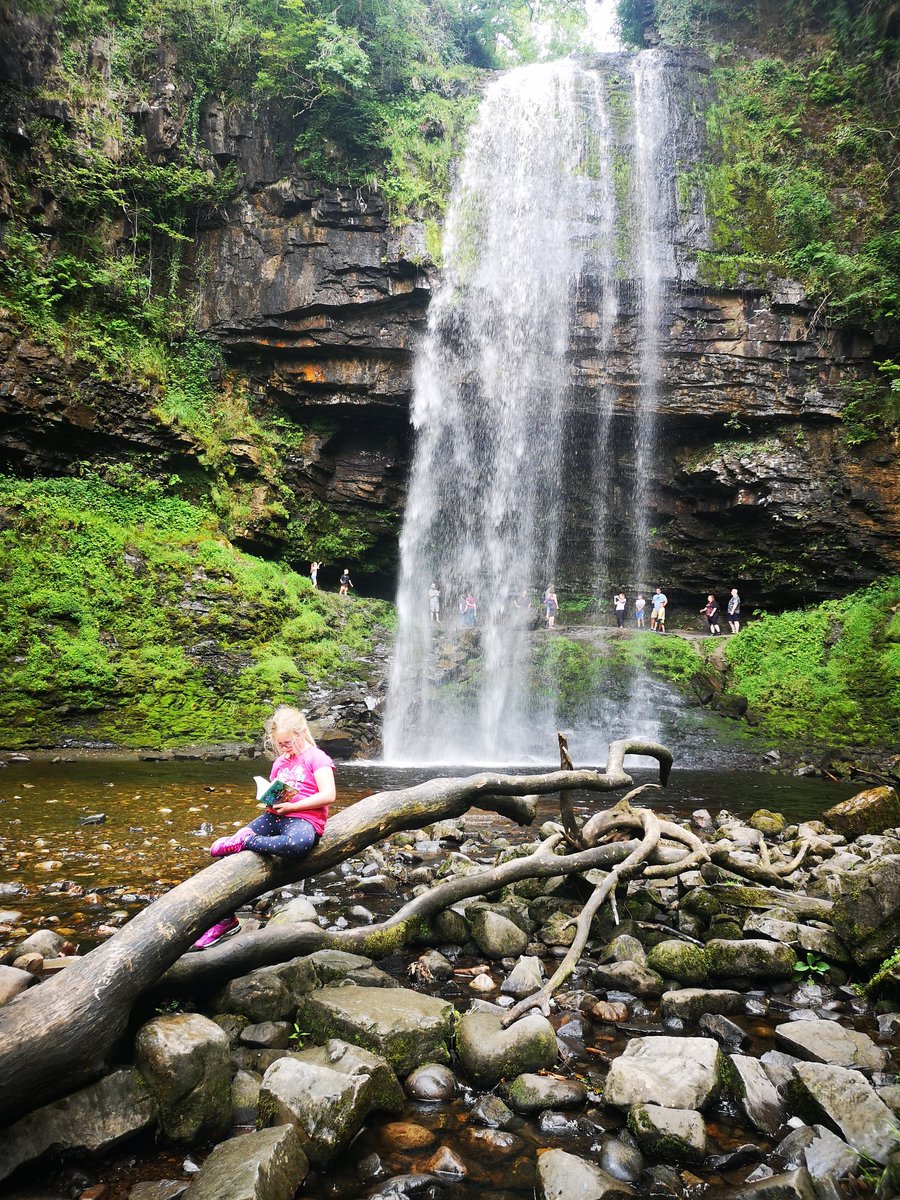 KathFenlon's tweet photo. @whitchurchprm Elesa relaxing with a book at #Henrhydfalls #batmancave #WPSSummerchallenge https://t.co/XsMtGPczvZ