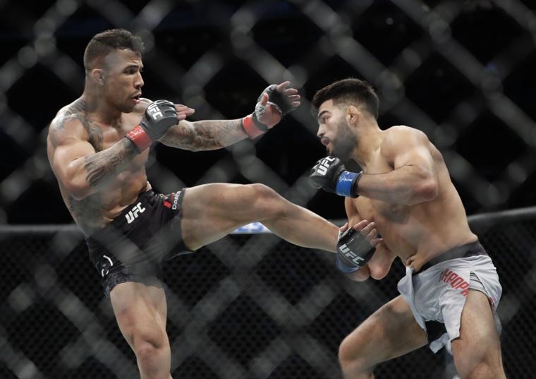 TOLOnews's tweet photo. Afghan #MMA fighter Nasrat Haqparast earned his third #UFC  win and first stoppage in the Octagon, in New Jersey, USA, halting Brazil’s Joaquim Silva in the second round. #Afghanistan https://t.co/WnDinJM9DF