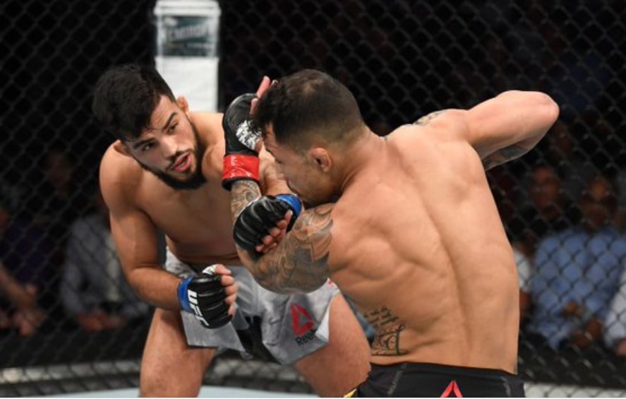 TOLOnews's tweet photo. Afghan #MMA fighter Nasrat Haqparast earned his third #UFC  win and first stoppage in the Octagon, in New Jersey, USA, halting Brazil’s Joaquim Silva in the second round. #Afghanistan https://t.co/WnDinJM9DF
