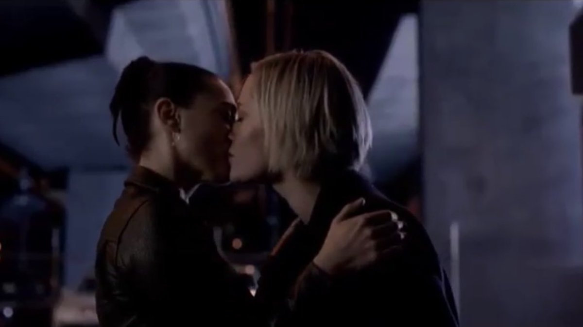 katie mcgrath wearing a leather jacket while kissing a woman,wowpic.twitter...