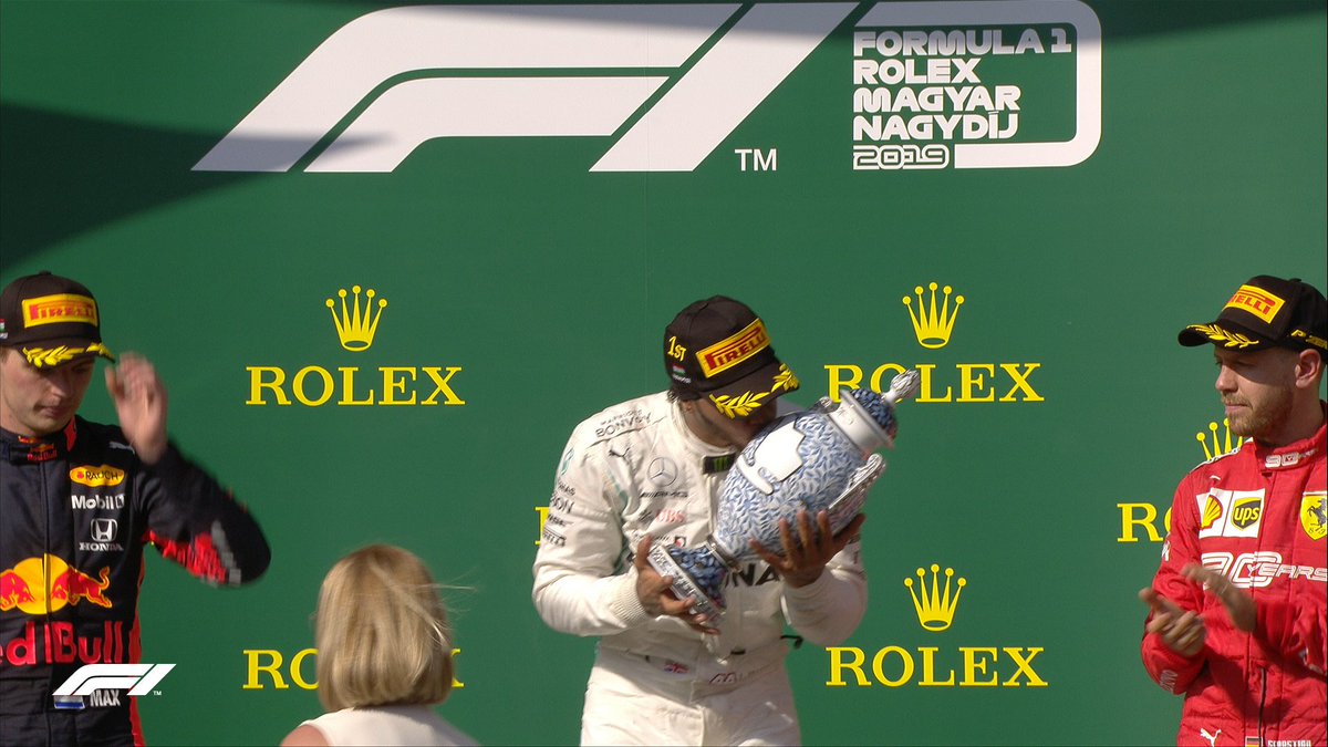 F1's tweet photo. 😘

A lot of you didn't believe he'd get it - and maybe even Hamilton didn't 

But that's the top step and the trophy 🏆

#F1 🇭🇺 #HungarianGP https://t.co/xtHuyMRywZ