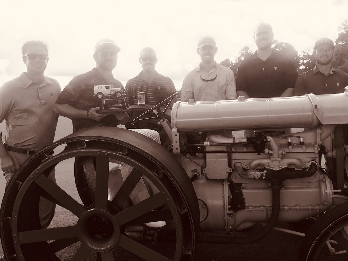 NelsonjCaron's tweet photo. Here is our #gaopen winner, Barret Waters sitting on our Henry Ford vintage tractor celebrating his victory & our club heritage. He is joined by the @fordplantation #superintendentteam. He played unbelievable golf down the stretch and won in an exciting playoff. Well done! https://t.co/Pe3sOggDft