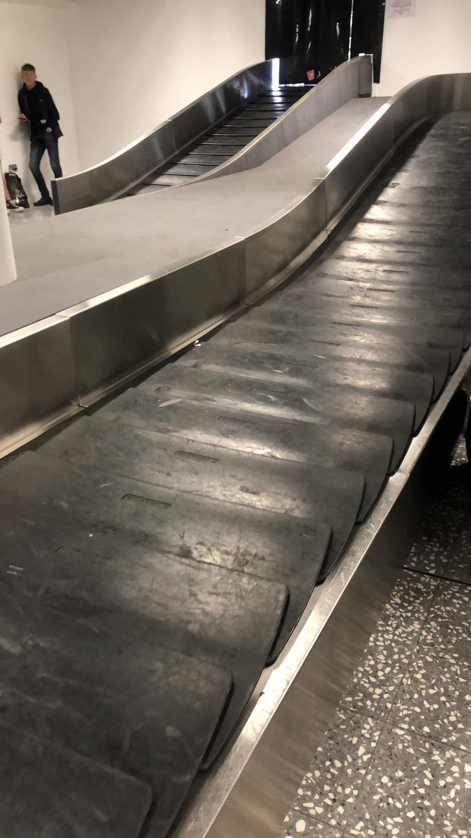 jesstucks's tweet photo. @BristolAirport after a very long day (delayed at Glasgow for 2.25 hrs), now a v long wait for baggage! Landed at 6pm, current status - an empty carousel 😢 and a lot of tired, hot people (and kids!) https://t.co/OevBngZQlf