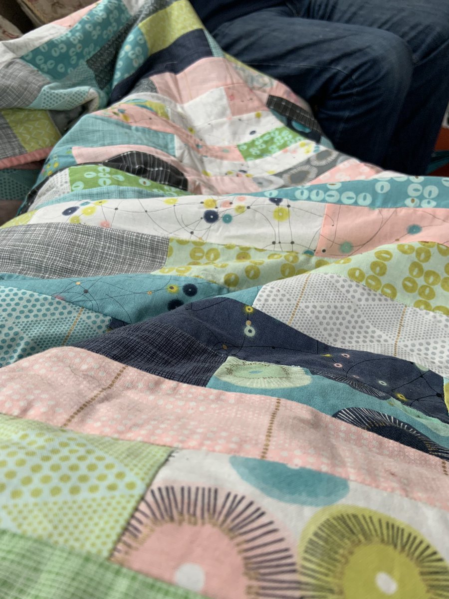 doogarry's tweet photo. Cold this evening. Feeling Cosy & smug (also snug 😂) under my #Jellyroll #patchwork #quiltinaday made @AppletreeCrafts #jellyrollrace @ModaFabrics #dayinparis #sewing 🧵❤️#quilting #fleece #cotton https://t.co/p3t5yhwhwx