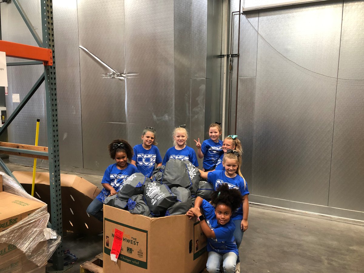 DrJSPatton's tweet photo. So very proud of #EFPX2 and her teammates providing service to the community yesterday! One of their projects was creating over 50 breakfast bags for kids in SLO County! #EveryoneCanServe #CCE #Sparks #CheerPrepTeam #SLOFoodBank https://t.co/1tJ8R0K5Pj