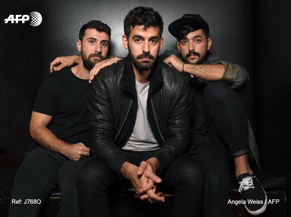 afpfr's tweet image. Le groupe néerlandais de metal symphonique "Within Temptation" a décidé d'annuler un concert dans un festival au Liban par "solidarité" avec le groupe de rock libanais Meshrou' Leila dont la performance a été déprogrammée après de virulentes critiques de groupes chrétiens #AFP