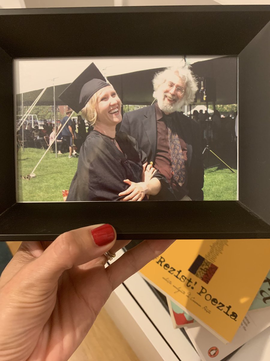 And here’s one of my favorite photos in the whole world, which I keep in my living room:  @LloydSchwartz and me, at my undergrad graduation, laughing.
