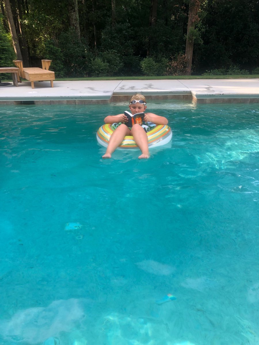 katiemclawson's tweet photo. .@CFESMediaCenter the Lawson boys are ending summer and completing their bingo cards with a pool read. #nosplashing https://t.co/bXRNqQM7XT