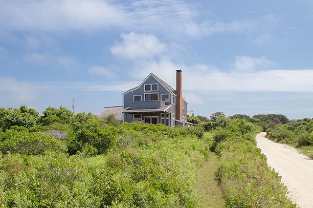 The second floor at #22EelPointRoad has an expansive, open-concept living and dining area with a sizable deck facing Dionis Beach to the west. The light-filled kitchen can be found off the dining area with pastoral views and peeks of the ocean.