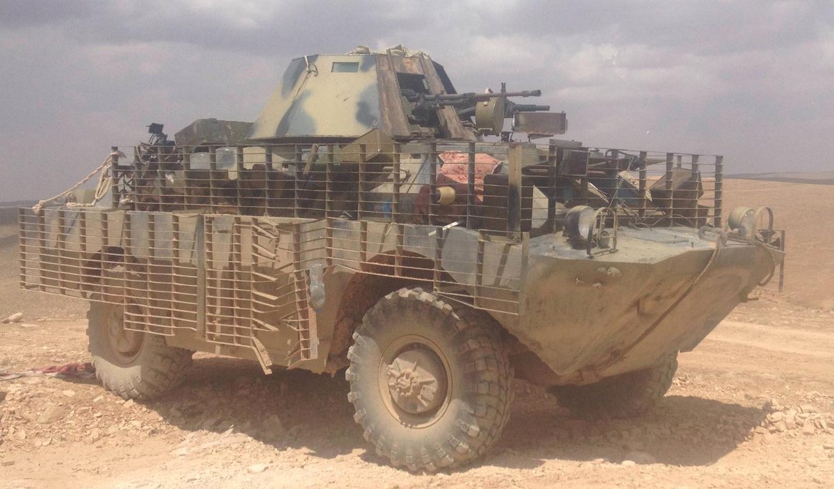 Possible evidence of PMC presence in recent fighting in Hama, as modified BRDM is seen in a new video(1st photo).For more on Ru PMC modified BRDMs see -( https://twitter.com/warsmonitoring/status/904333223727157248)This same modification survived a battle for Aleppo&against IS in the Syrian desert. Now in N.Hama?