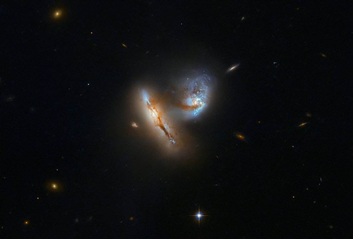 HUBBLE_space's tweet photo. This galactic duo is interacting in a similar process that will see our Galaxy, the Milky Way, collide with the Andromeda Galaxy — already nicknamed #Milkomeda. Credit: @ESA / @Hubble_Space / @NASA https://t.co/PExqxjjyi9 https://t.co/Q52iS9am9u