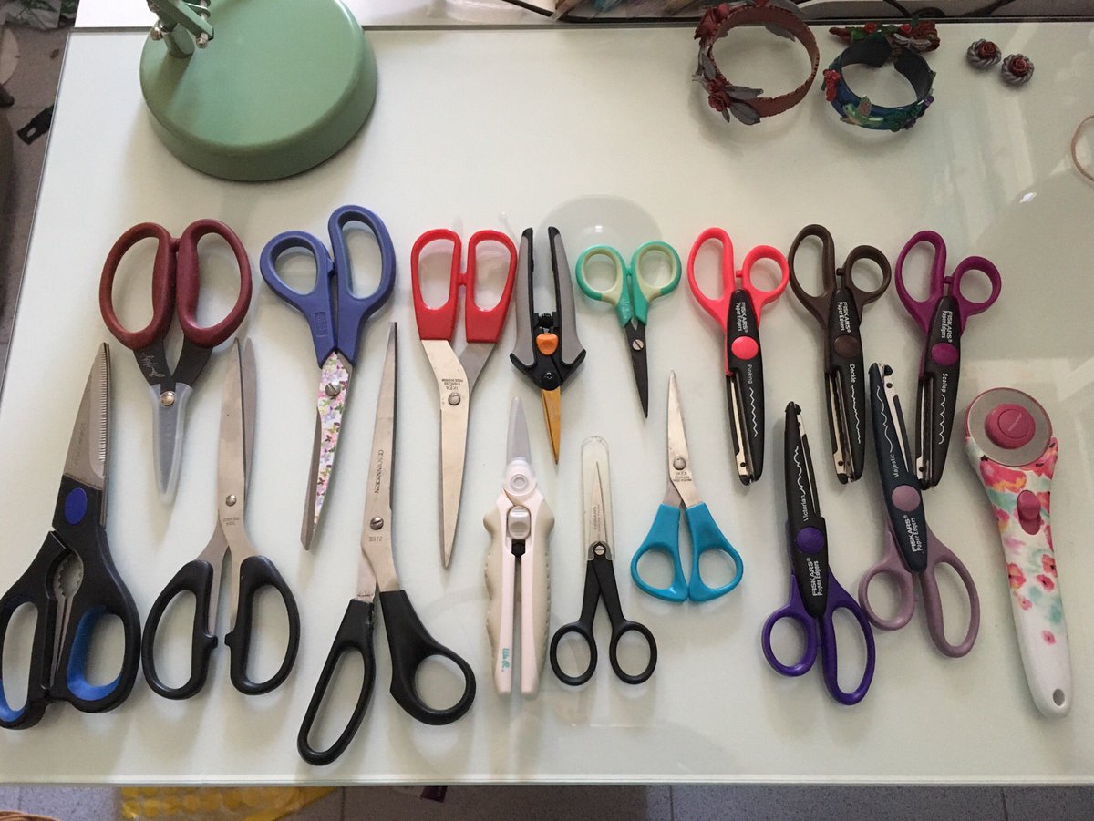 Kialaya's tweet photo. So here is my #scissorschallenge to all you #crafters out there. How many do you own for #Craft purposes? Which is you favorite, the ones you cant live without? Id have to say for me its the Tim Holtz, the WeRMemoryKeepers and small Fiskars #manualidades #scrapbooking https://t.co/H6XViRH6LA