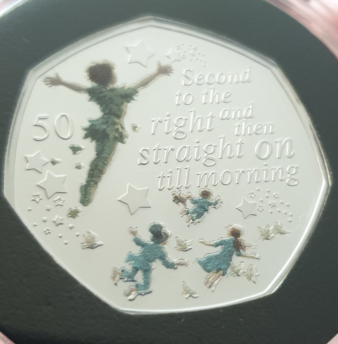 flump54321's tweet photo. @ChangeChecker @WestminsterGB look what arrived today! Well impressed by the Peter Pan silver proof 50p coins! Quite possibly the best designed 50p coins ever, a fantastic subject ... and also nice to know supporting the brilliant @GOSHCharity https://t.co/XfdMBrZpE2
