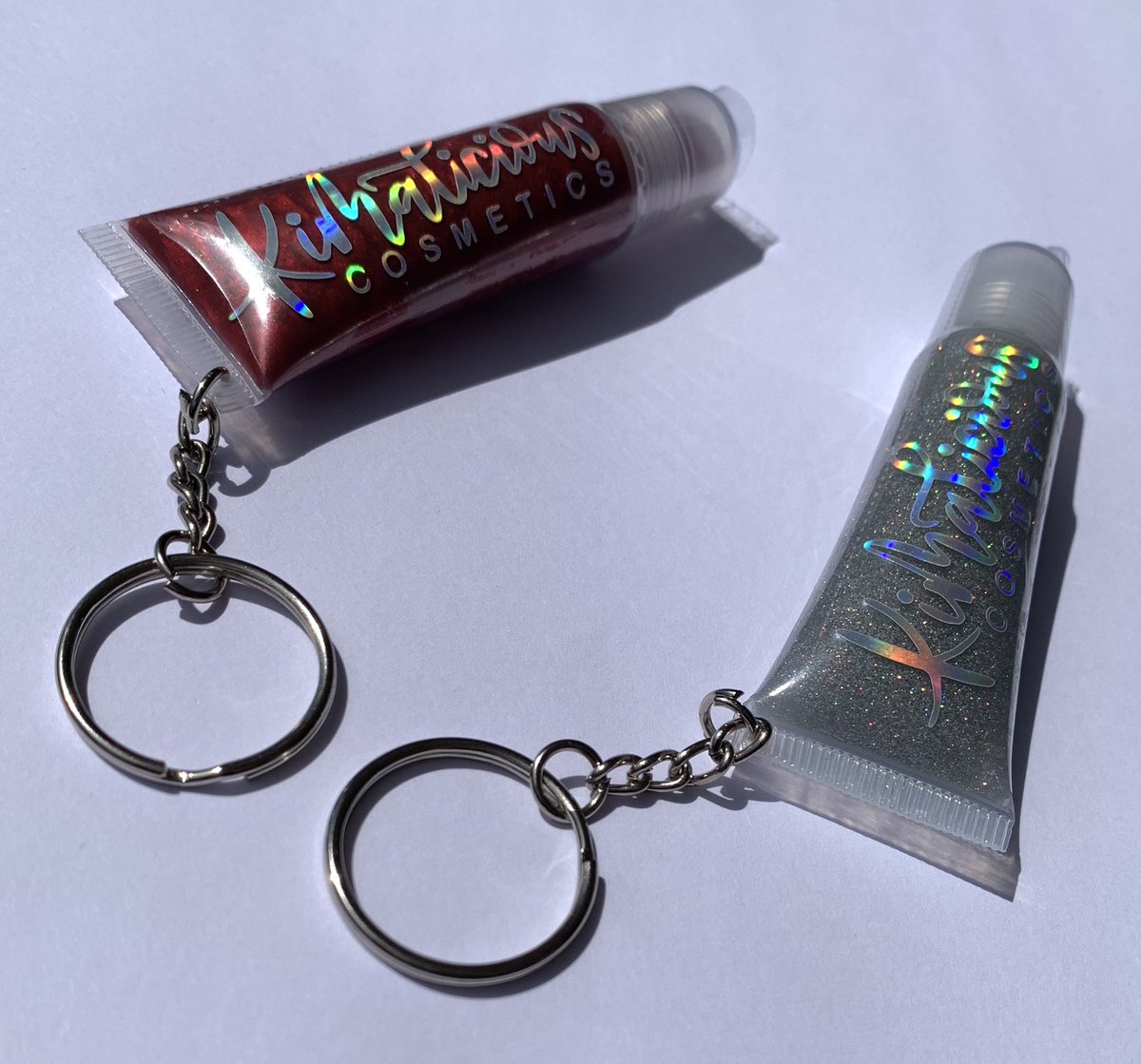 KimaliciousLips's tweet photo. Ladies, why dig through your purse when you can carry it on your keys?! Kimalicious Cosmetics Inc. Keychains are available at https://t.co/5jFIMFRYZV. Shop Now with the link in our bio! 💋 
#KimaliciousCosmetics #KimaliciousKutie  #VeganCosmetics #LiquidMatteLipstick #LipSwatch https://t.co/Z1t0yCRhFO