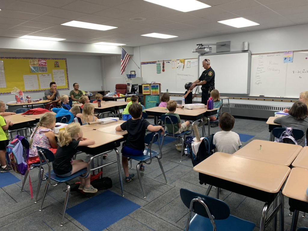 Bushey2015's tweet photo. @Riverview_Elem 
Thank you to @Kenosha_Sheriff Deputy Rowe and Deputy Rude for talking to our Riverview summer school classes about bike safety. We all learned a lot. #CometSafety https://t.co/bEkZST4xTr