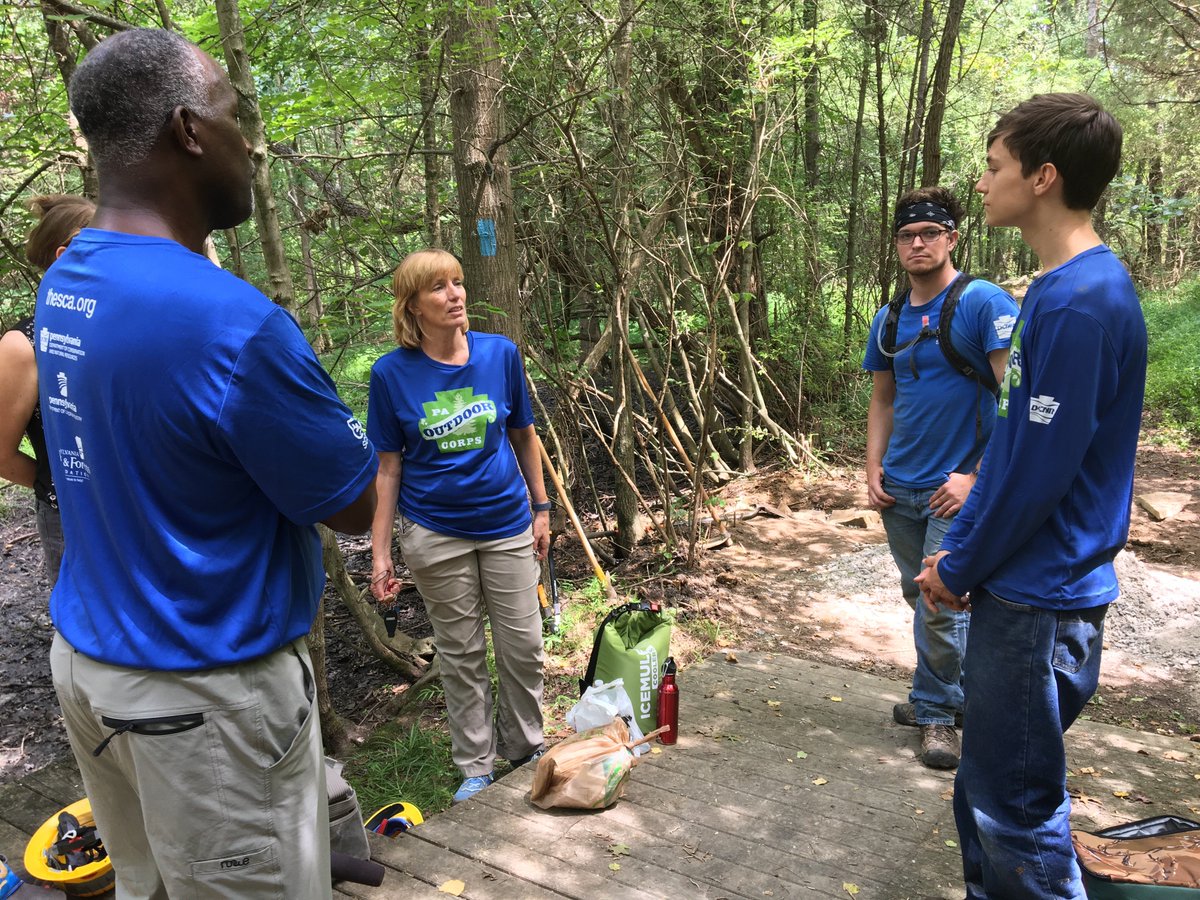 DCNRnews's tweet photo. DCNR Sec. Cindy Adams Dunn &amp; Office of Administration Sec. Michael Newsome work with the #PAOutdoorCorps York summer youth crew at #GiffordPinchotStatePark. 
The crew is fixing trails. #PAProud #PAYouth https://t.co/Si30i0cIR0