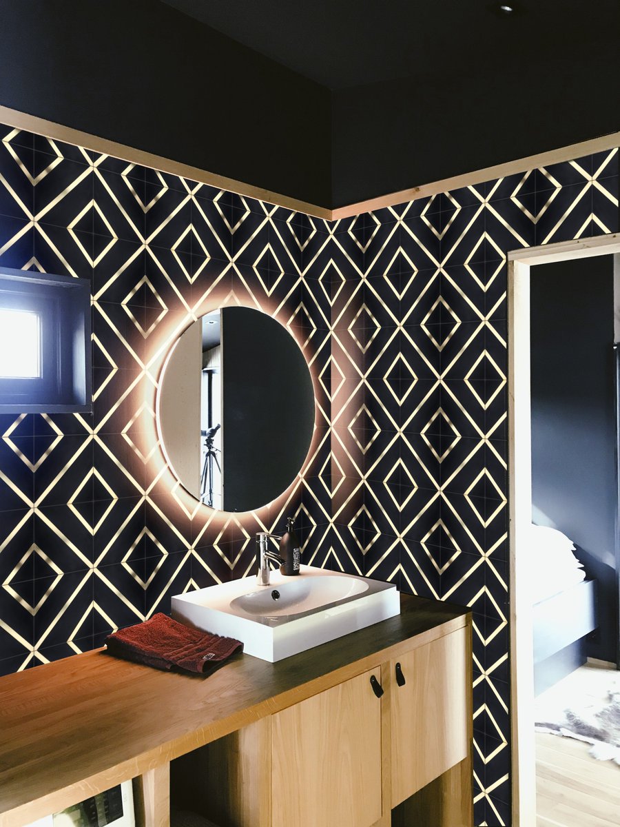 kspewock's tweet photo. Don't let anyone tell you a bath cannot be dark...check out this elegant master in black cement tile with brass strips...seriously beautiful.  #ceramichetileandstone #interiordesign #pittsburgh #lilitile #tileobsessed #fortheloveoftile https://t.co/d4z89DjuJR