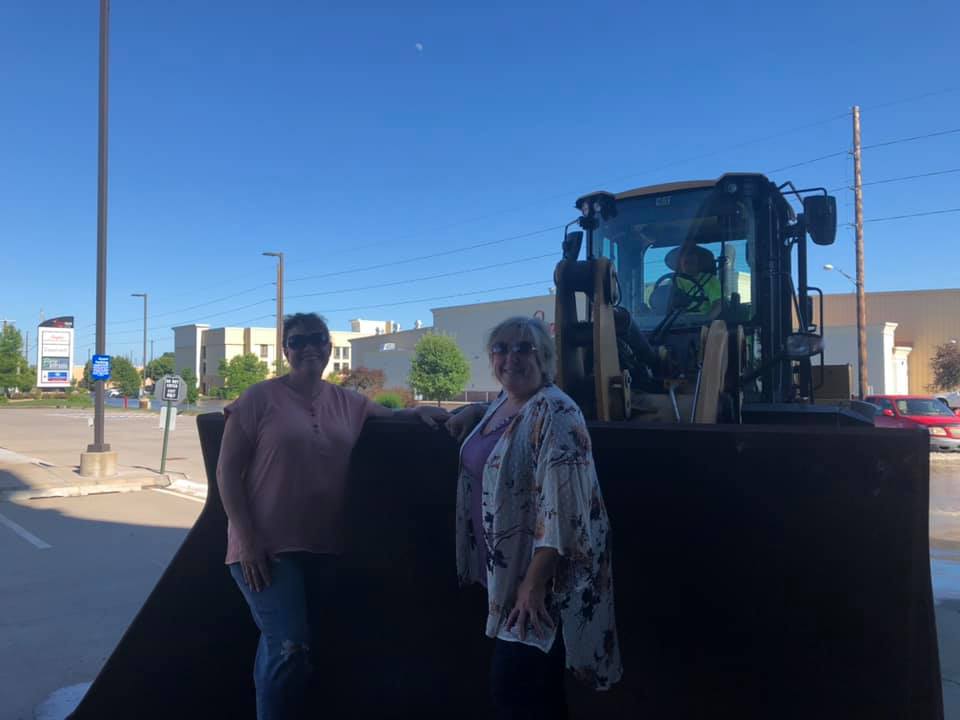 thinkengage's tweet photo. Shout out to Engage team members Wendy and Judy who went above and beyond during a recent site visit in Kearney, NE. They had to be transported back to their hotel in front loader. At least 300 people needed to be evacuated due to the severe flooding. 😮 #thinkengage https://t.co/KEWWlZvohc