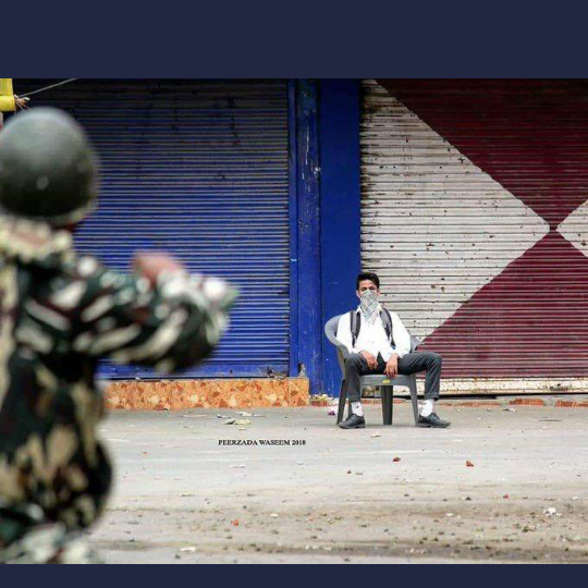 aimennoor516's tweet photo. This courage is more powerful than your guns
 #ModiKillingKashmiris https://t.co/MxxLtyAWlp