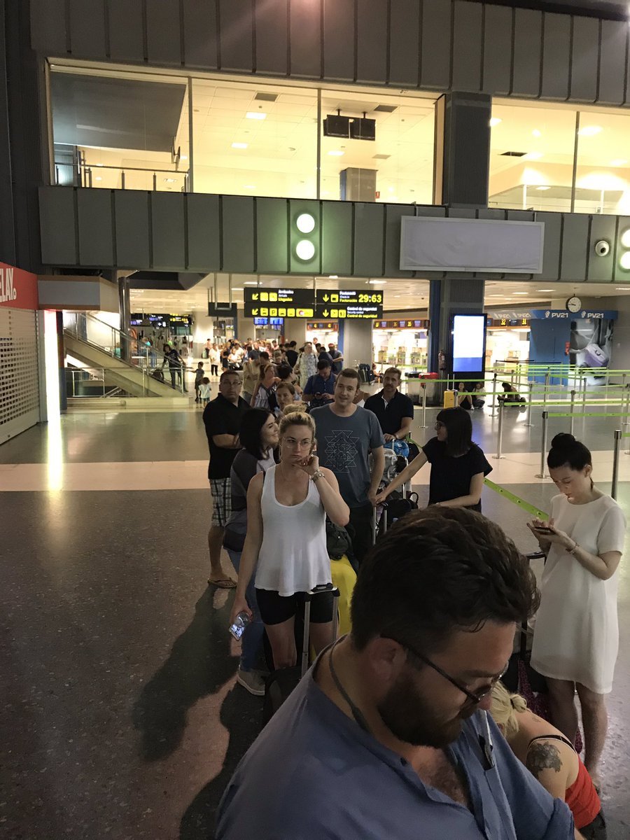 MaxineJAllen's tweet photo. @British_Airways Two hours after we were supposed to fly and this is how long the queue still is. https://t.co/wwrG7qysjS