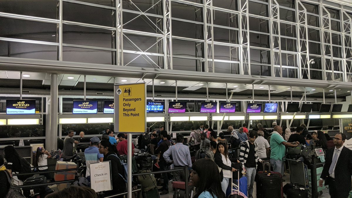 Dear @EtihadAirways you need to get help at the #JFK check-in counters. The lines are crazy long and hardly moving. Only 7 counters open for Economy. Older passengers can barely stand. Airport security being high handed. <a href="/EtihadHelp/">Etihad Help</a>