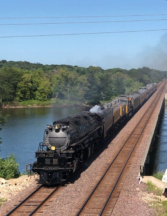 RailFanners's tweet photo. Our first RailFan photo since restart comes from @BuddyBurton "UP 4014 “Big Boy” crossing the Cedar River westbound in Cedar Rapids, IA. July 30, 2019." https://t.co/fdZLNCokqP