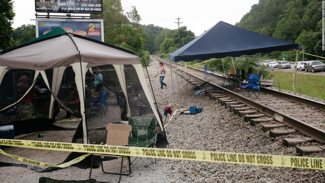 cnnbrk's tweet photo. A former coal tycoon has donated more than $1 million to a group of miners in Eastern Kentucky who are blocking train tracks in protest after their former employer stopped paying them after declaring bankruptcy https://t.co/HeEc1dLnYr https://t.co/EoA8hgv1WB