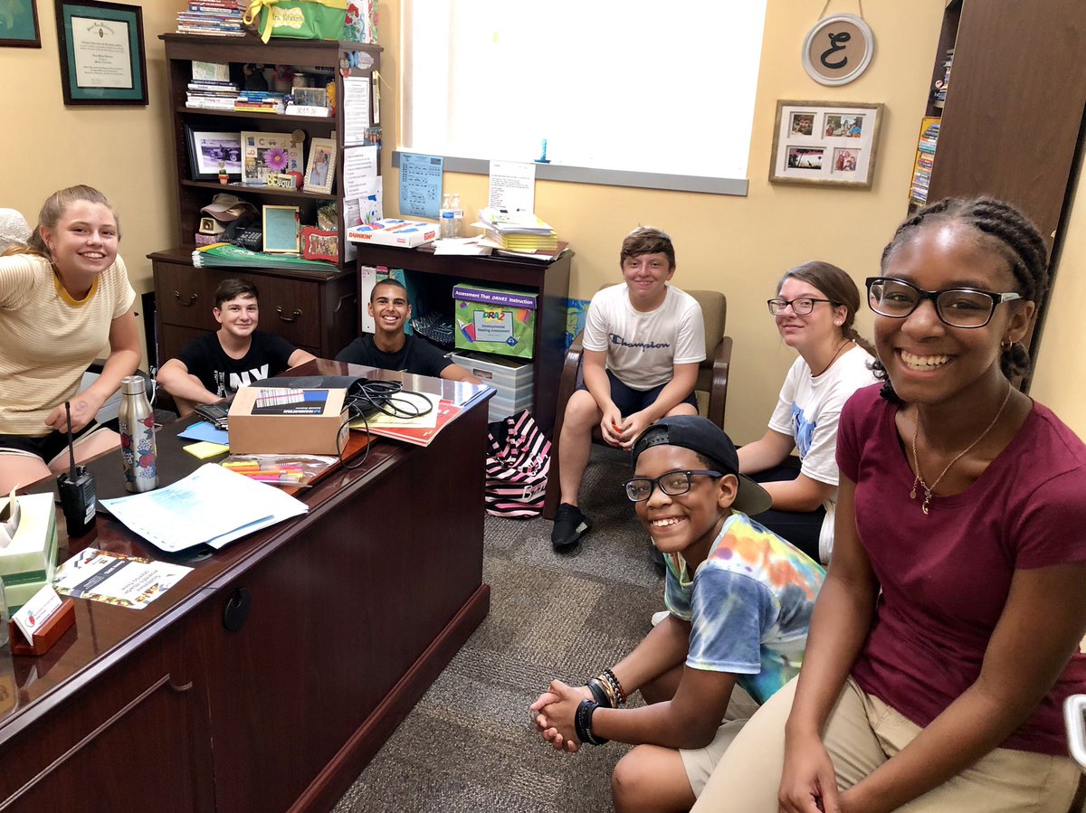 lvedwards414's tweet photo. Look at our math textbook adoption crew relaxing in my office after delivering books all day!  @HillsboroughSch Ss from @Sessumspride @HCPSNewsomeHS @VillageMs @HCPSRodgers all earning volunteer hours! #WeClimbTogether https://t.co/CE7KOHBlj4