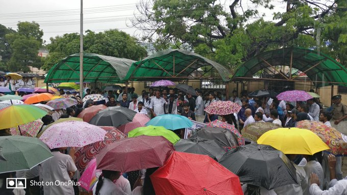 its_bhavyaT's tweet photo. It's raining and everyone's chilling, while we are protesting for the nation's health. Nothing will stop us, until justice is served. #SayNoToNMCbill https://t.co/SmcmGLXsYo