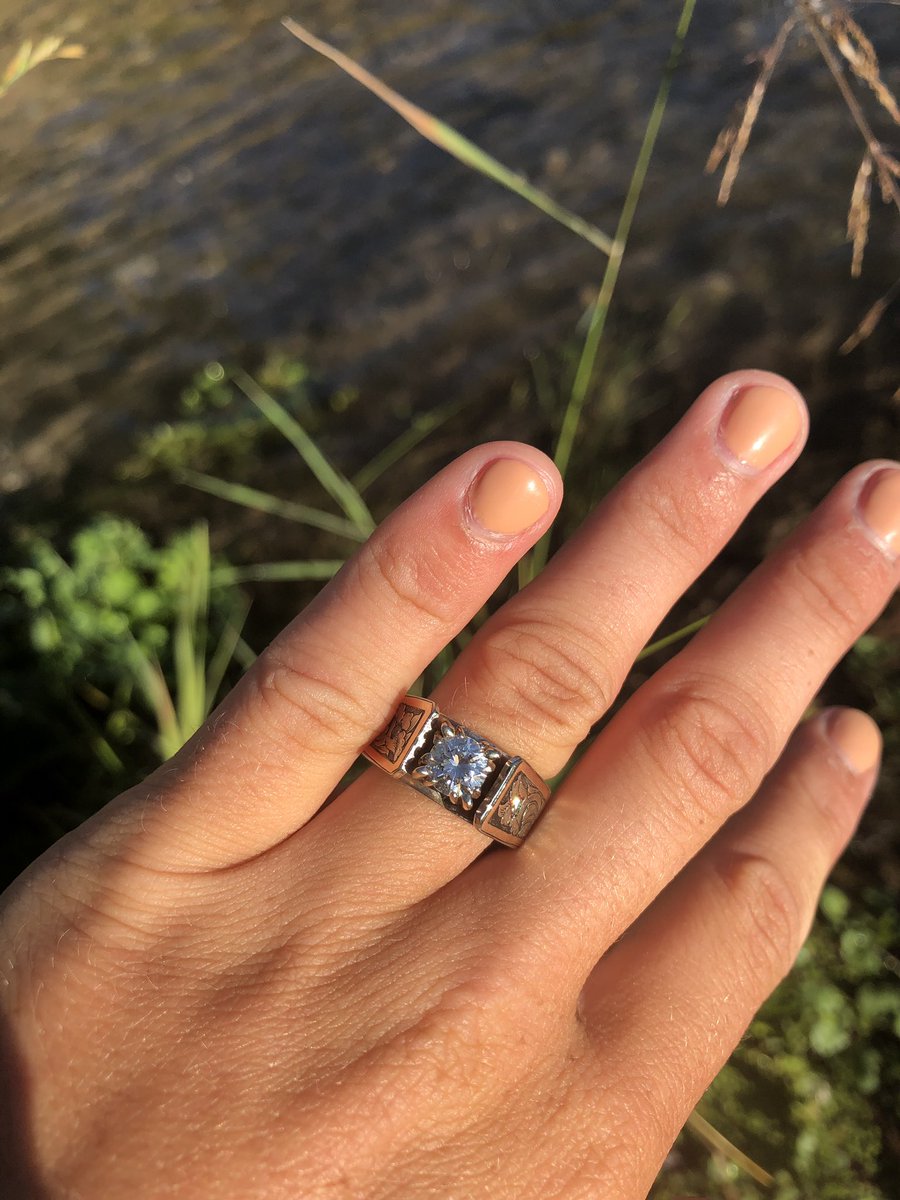 21cowhorses's tweet photo. Well, looking for stray cows didn’t go as planned. Turns out there weren’t any strays! Cody surprised me and proposed last night on the Buttes near his house with a custom rose gold, white gold and diamond ring. 💕 he didn’t have to go all out, but he did. https://t.co/OkpXivKcy5