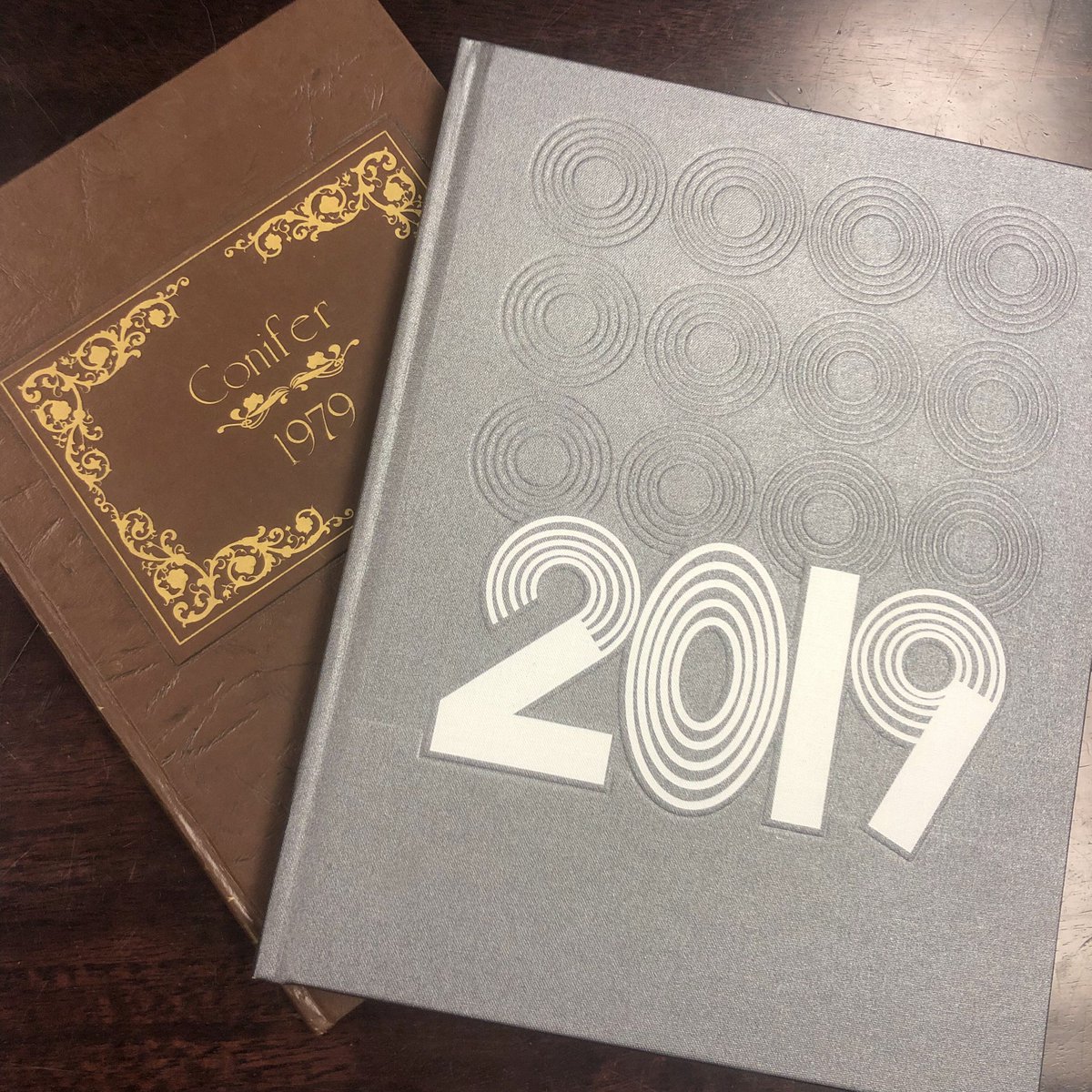 PinewoodAlumni's tweet photo. #ThenAndNowTuesday: Did you know the Pinewood yearbook has been produced for over 40 years? Previously known as the Conifer, the yearbook has been known as the Lyceum since 1981, when Pinewood merged with Summerville Academy. https://t.co/rg5Epkdrqw