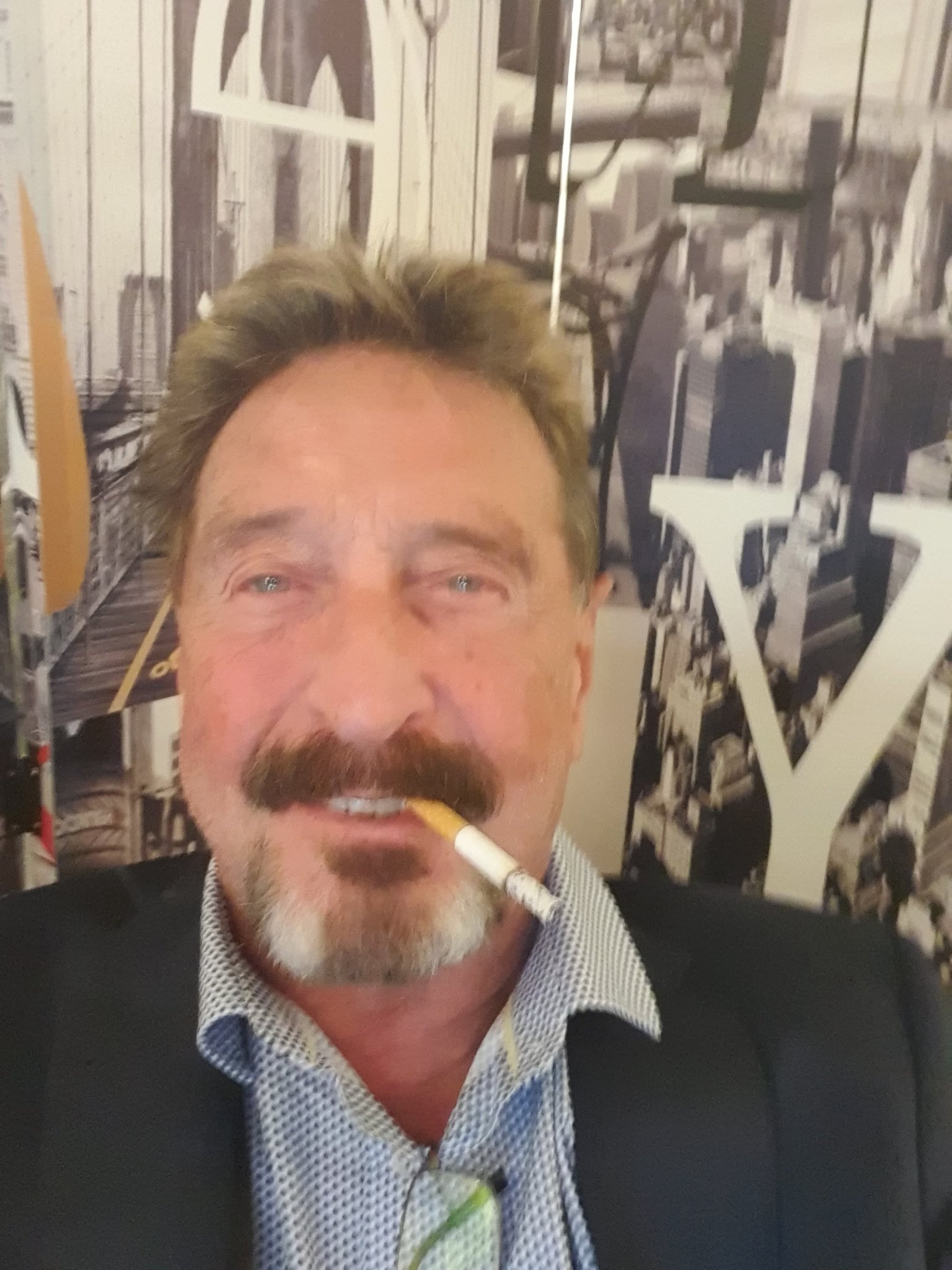 John McAfee on Twitter: &ldquo;Got a background screen for my communications