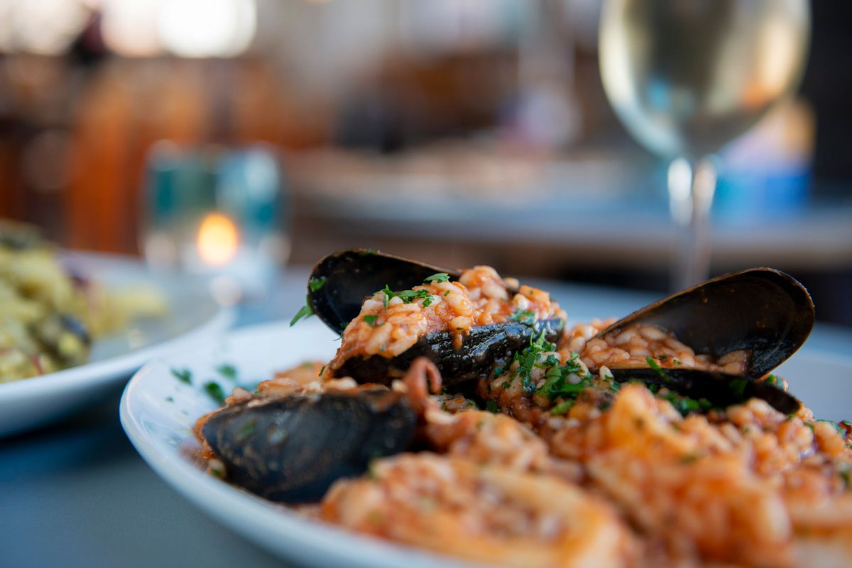Risotto rice should have a little bite to its centre but a naturally creamy and soft texture. It works wonderfully with this seafood mix of squid, prawn, octopus and mussels and a little creamy tomato sauce #nuposto  nuposto.com/?utm_source=Tw…