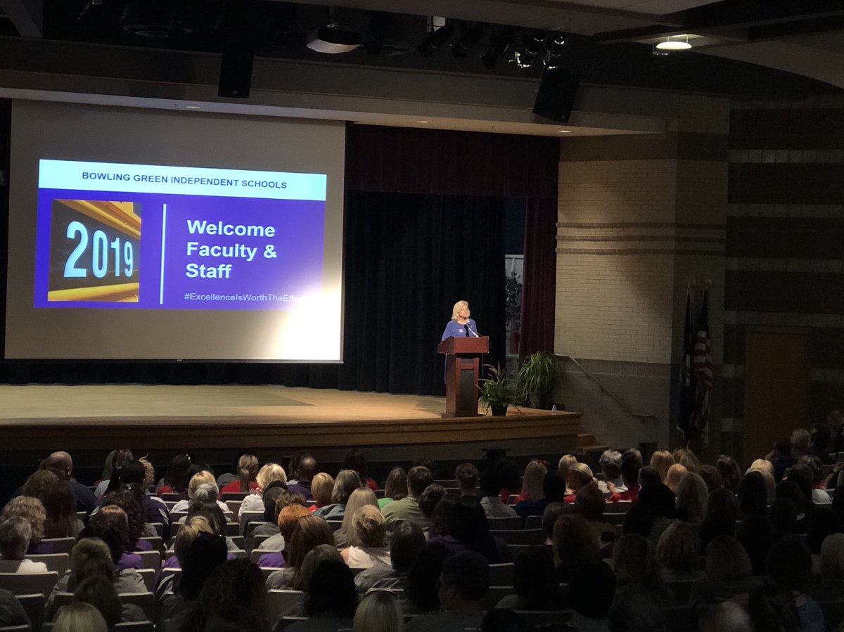 BGISD's tweet photo. Welcome back, faculty and staff! Opening Day 2019-20: Board of Education Chair, Jane Wilson addresses all BGISD employees at @BGJHS #excellenceisworththeeffort https://t.co/bjhVtKGQwe