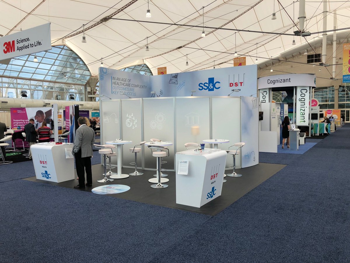 zapcreative's tweet photo. Taking an exhibit from rendering to the show floor. Private conference room, edge-glow bistro charging tables, mounted LCD, custom reception counters, furniture, and hardwood vinyl flooring. And it's a RENTAL #tradeshow #exhibitdesign #tradeshowexhibit https://t.co/y7zaYnbSJI