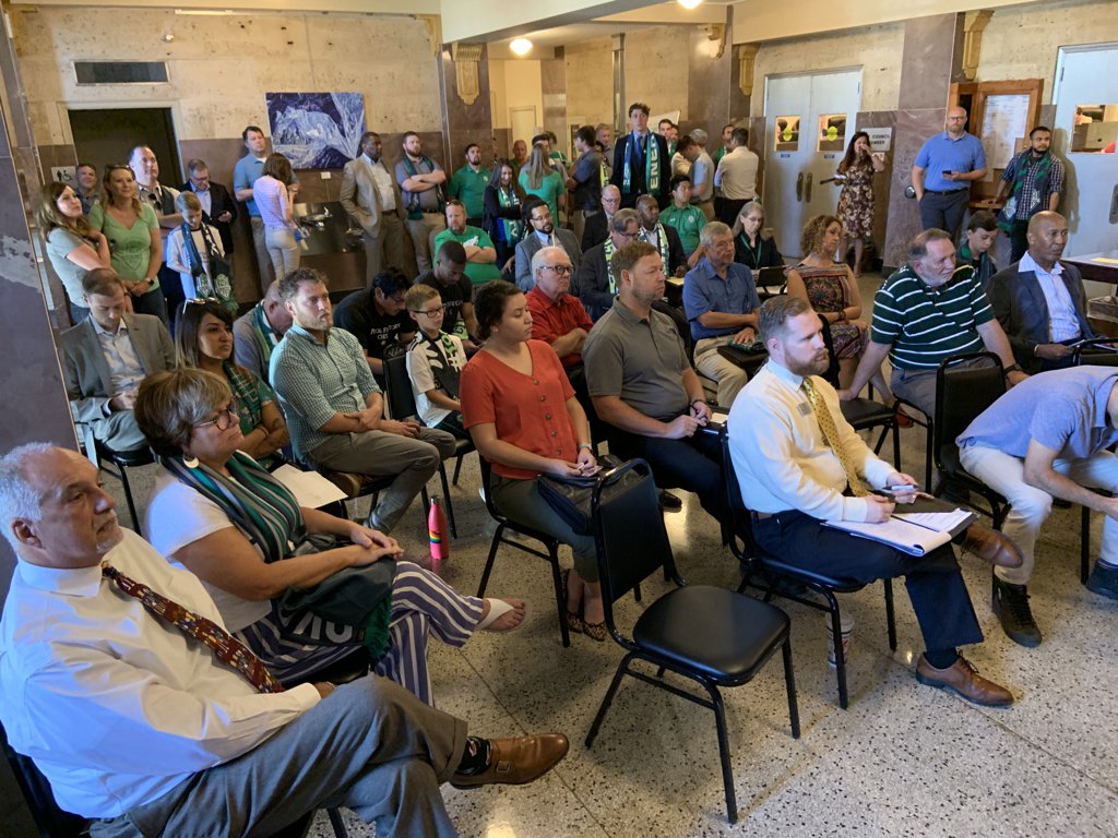 BrettDOkc's tweet image. Lobby outside the @cityofokc Council Chamber has become the  de facto staging area for the next group boosting their idea for #MAPS4. Right now, @EnergyFC supporters are waiting for their presentation.