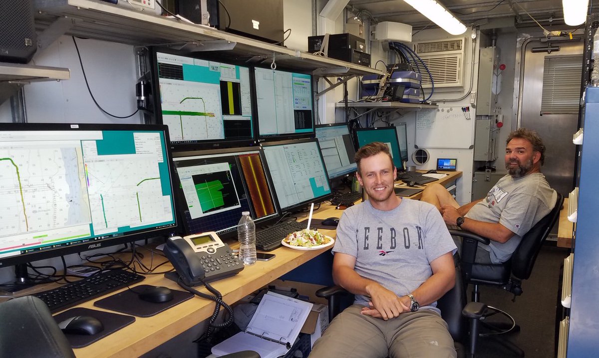 USGSCoastChange's tweet photo. #CapeCodBay2019 A look inside van life! Here we see #USGS researchers Jack Fredericks, Wayne Baldwin, and Laura Brothers inside the Acquisition Van watching all the #data come in while eating dinner!

#science #sciencecruise #fieldwork #seafloormapping #seafloor #mapping #CapeCod https://t.co/2WZIwLpNN4