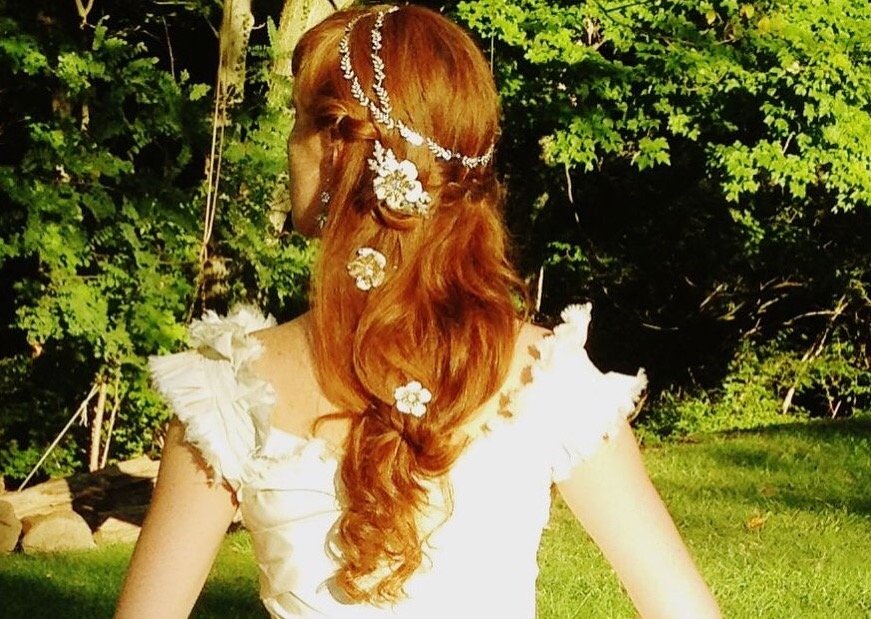 Tuesday Tips - Wear a simple wreath and then sprinkle some pins down your braid or half-up hairdo.  Makes quite a statement from the back.  It's like a little surprise for your guests.  #parisbydebramoreland #bridal #accessories #wreath #halo #bridalhair #headpiece #hairpins