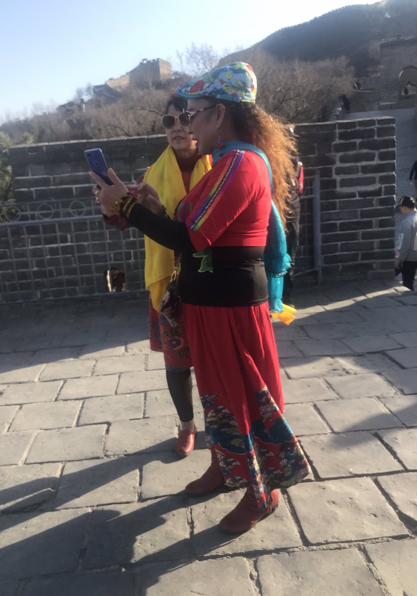 (15)FASHION IN CHINA, specifically old lady fashion was extremely extravagant, colorful, pattern on pattern, color on color.