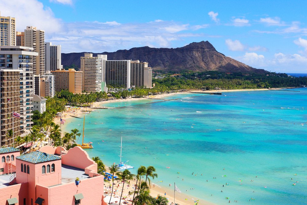 property_metro's tweet photo. The sands of Waikiki Beach are hard to resist when visiting #Honolulu. #thingstodo  https://t.co/EnaxpbDneu https://t.co/tJgSPnIPWV