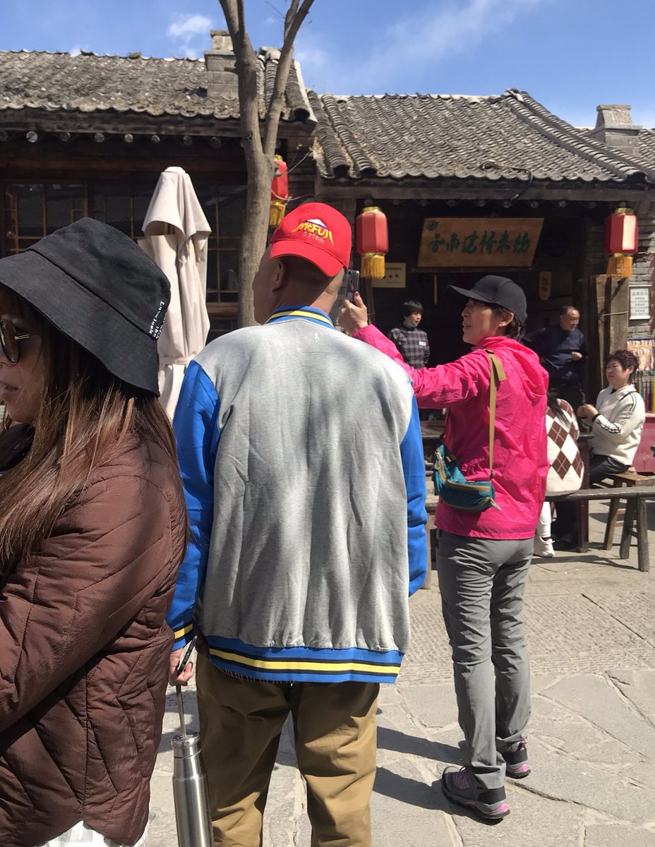 (18)FASHION IN CHINA PT. 4, a lot of old men would wear their dad hats on top of their head and tilted to the side gangster-style Then captured a pic of these fish shoes, and I did see some young women wearing traditional outfits like the last 2 occasionally