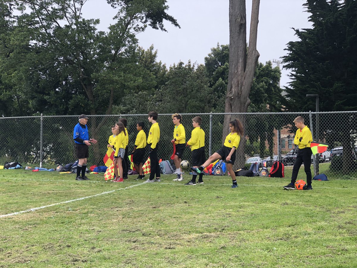 SFYouthSoccer's tweet photo. Day 2 of the SF Summer Youth #RefCamp : Offside and Restarting Play, incl. Direct &amp; Indirect Free Kicks, PKs. And our Instructors are mic’d up to coordinate across the field! https://t.co/q3laEy4IOG