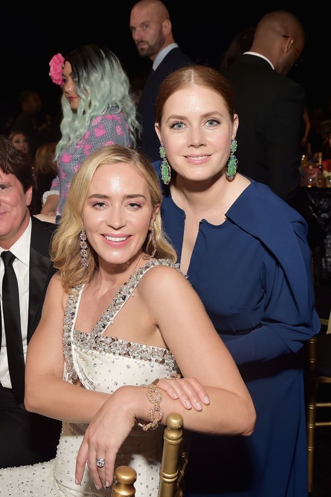 emily blunt & amy adams:“i met emily in my trailer. i had shoulder pads and she had a hideous skirt on. she was wearing a low cut top. i stared at her breasts and the rest is history.”