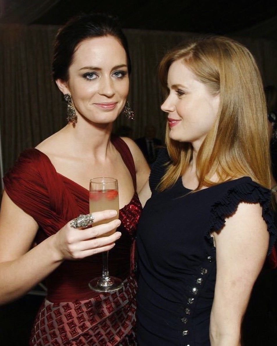 emily blunt & amy adams:“i met emily in my trailer. i had shoulder pads and she had a hideous skirt on. she was wearing a low cut top. i stared at her breasts and the rest is history.”